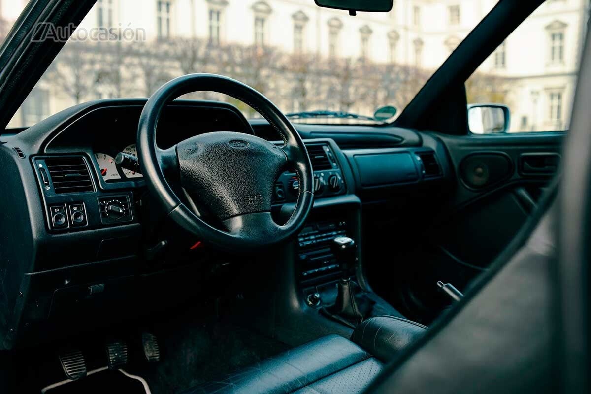 This copy of the Ford Escort RS Cosworth features Recaro seats and leather upholstery.