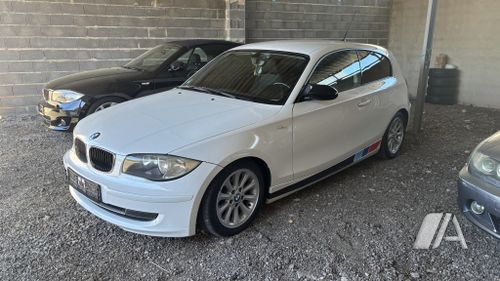 BMW Serie 1 2009, foto 1