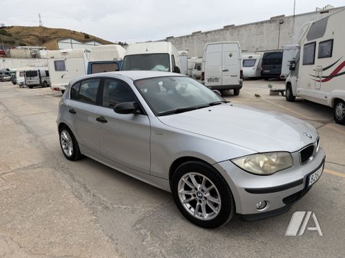 BMW Serie 1 116 i 2006, foto 1