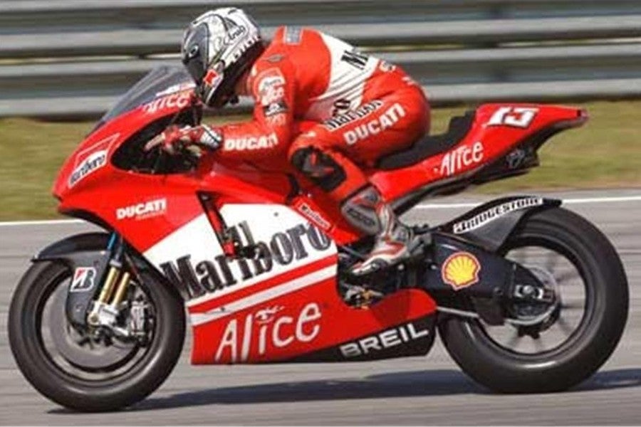 Capirossi y Rossi los más rápidos bajo la lluvia