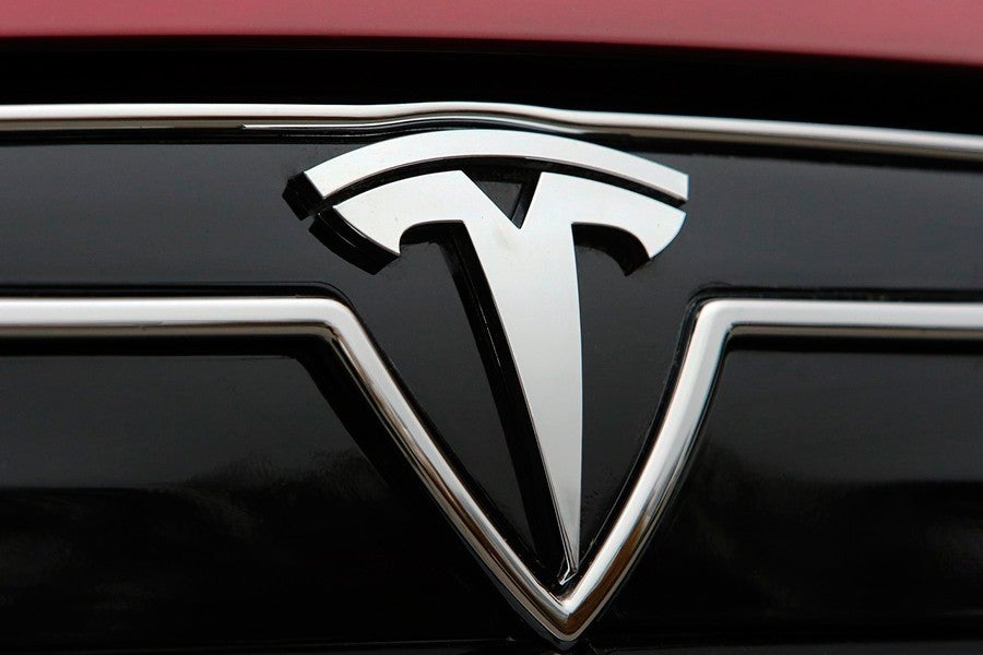 What does the Tesla logo mean?